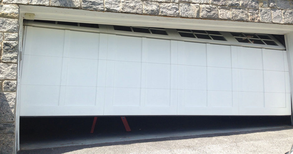 Broken garage door repairs Rochester